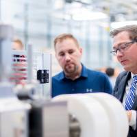 Guests looking at a project